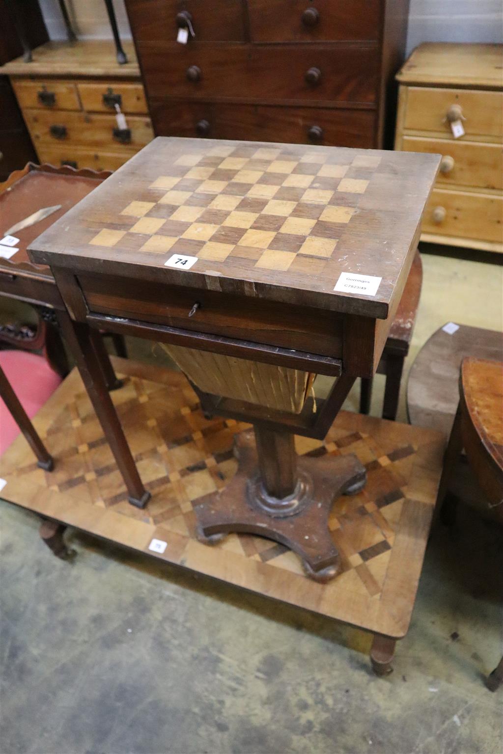 A Victorian rosewood topped games / work table, width 44cm, depth 33cm, height 73cm